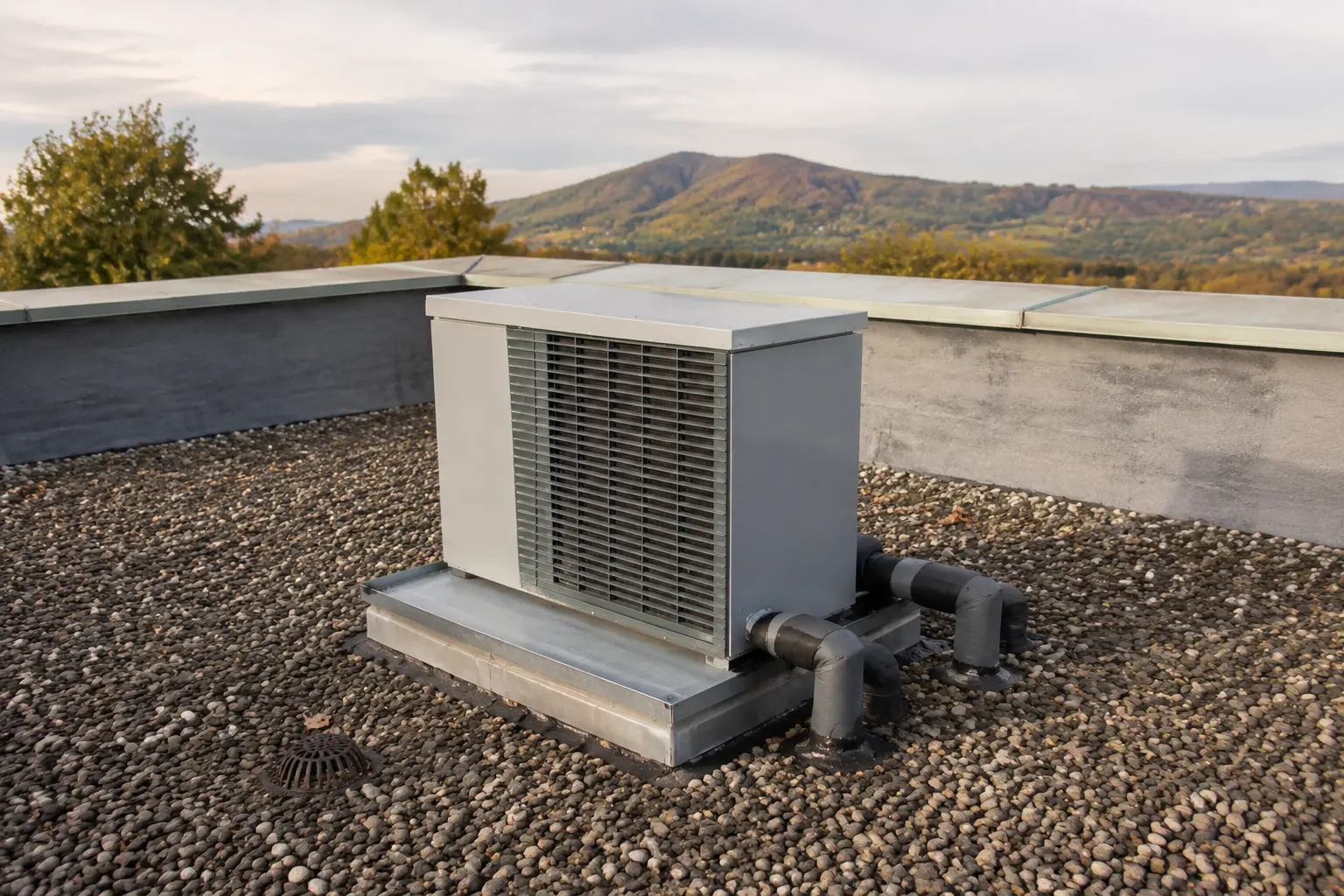 Curb mounted packaged rooftop heat pump unit on a Spokane building
